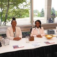 MI-ACE Women of Color Collaborative Welcome table
